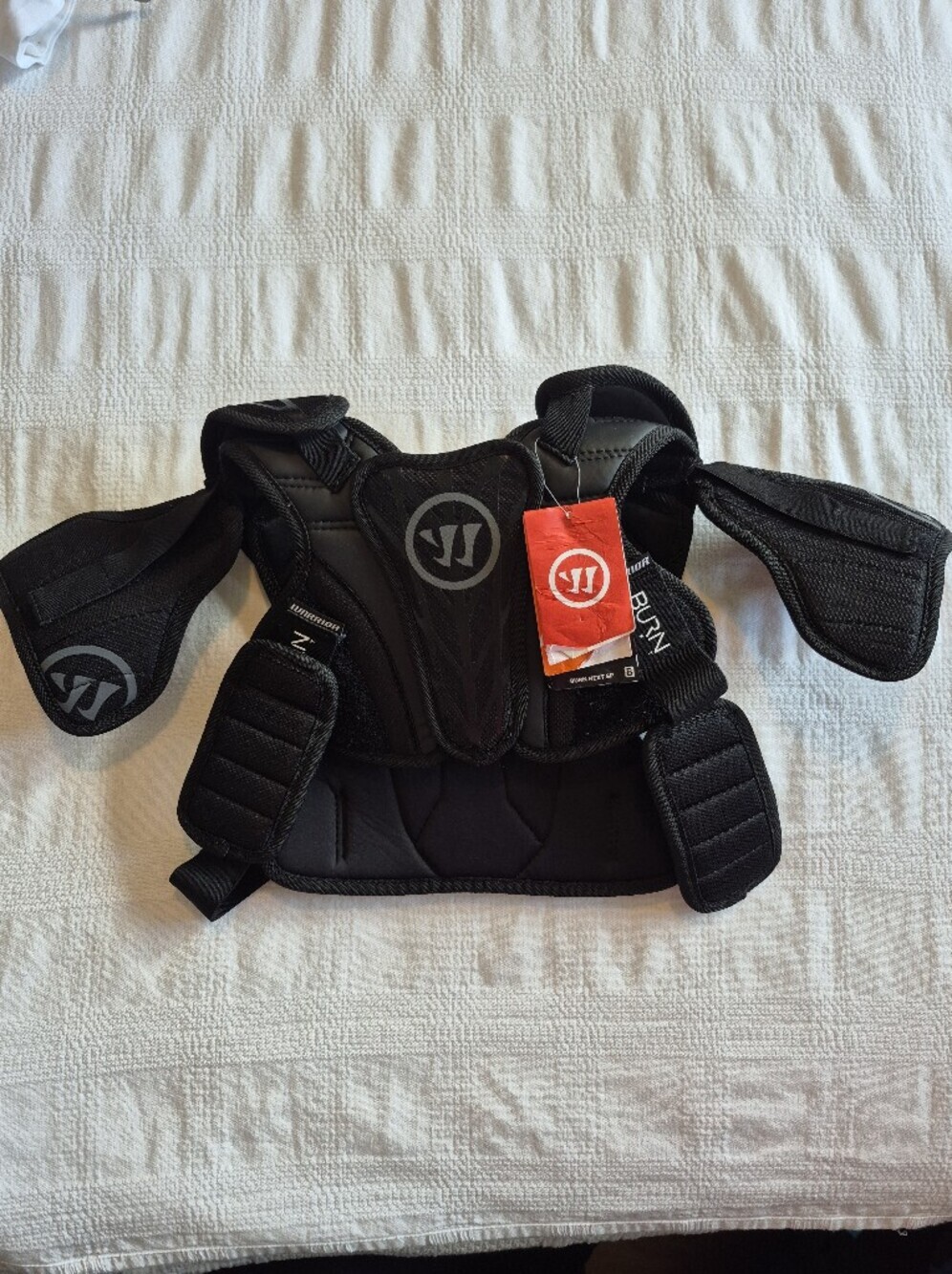 Warrior Burn Next youth Medium lacrosse black adjustable shoulder/chests pad NWT